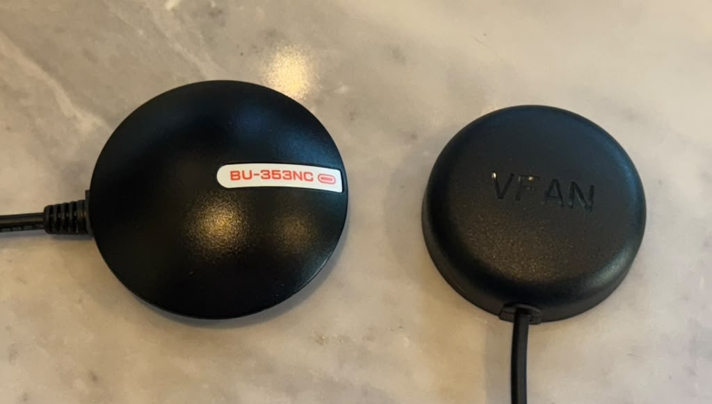 The two tested USB GPS receivers side by side: the GlobalSat BU-353NC and the V-FAN UG-353